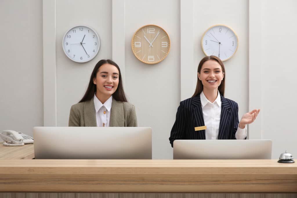 happy-employees- in-the-hotel-reception